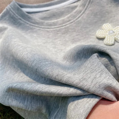 Set de pantalones corto con flor de perlas