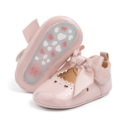 Zapatillas para bebé con lazo