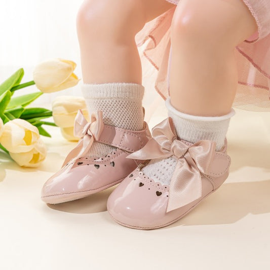 Zapatillas para bebé con lazo
